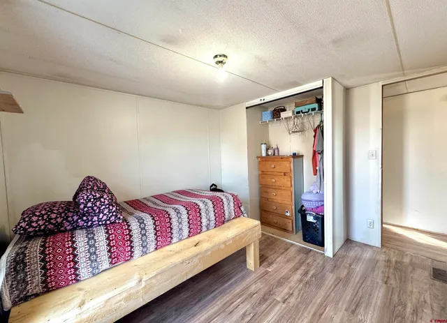 a bed room with a bed and a couch