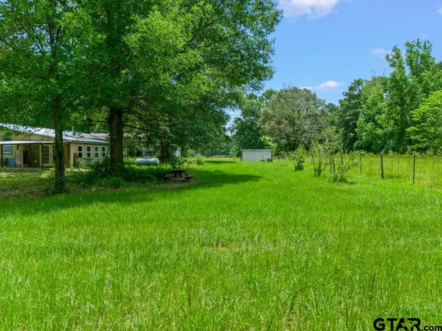 a view of a green yard