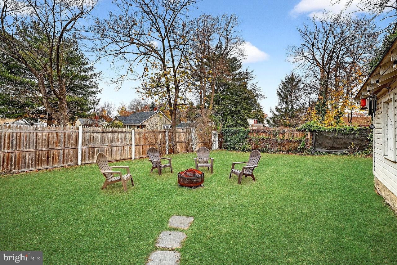 512 Spruce Street Delanco, NJ 08075 - Photo 22 of 24 a garden with trees in the background