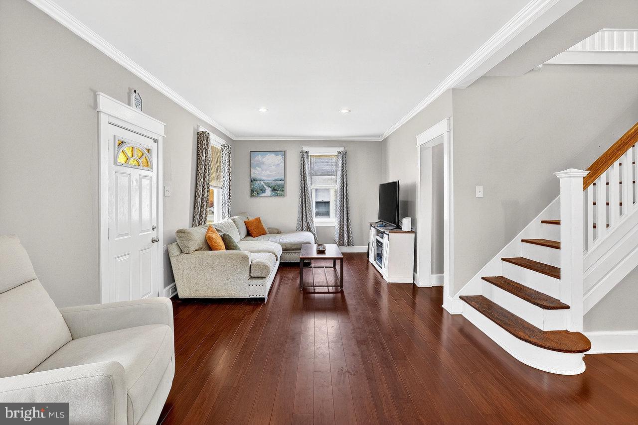 512 Spruce Street Delanco, NJ 08075 - Photo 4 of 24 a living room with furniture and wooden floor