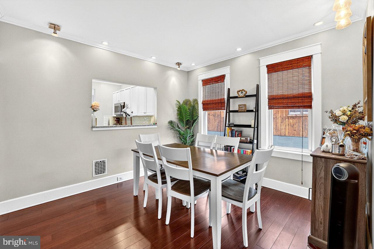 512 Spruce Street Delanco, NJ 08075 - Photo 7 of 24 a view of a dining room with furniture window and wooden floor