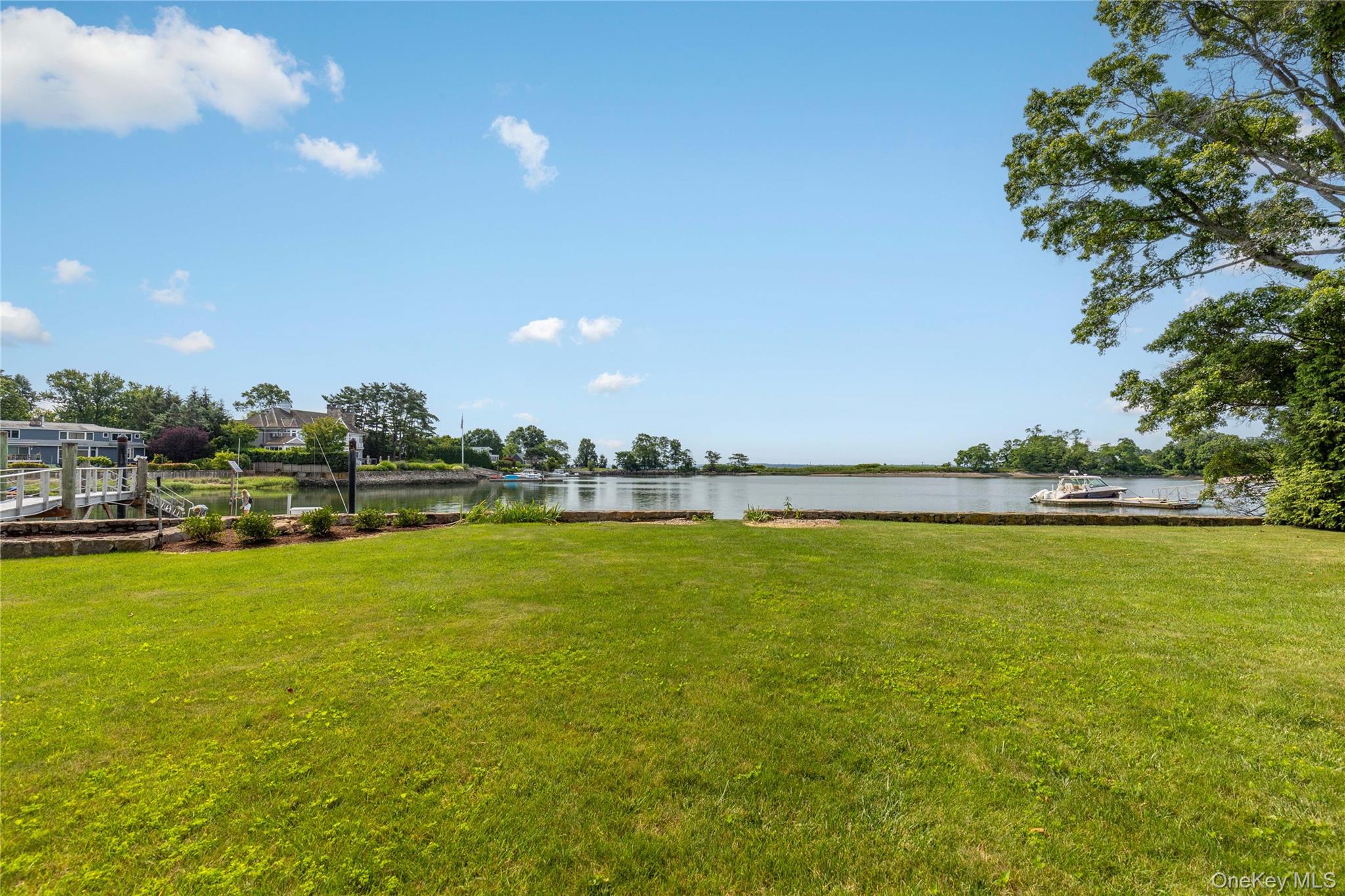 1160 Greacen Point Road Mamaroneck, NY 10543 - Photo 40 of 45 Expansive lawn offers endless possibilities for recreation and entertaining