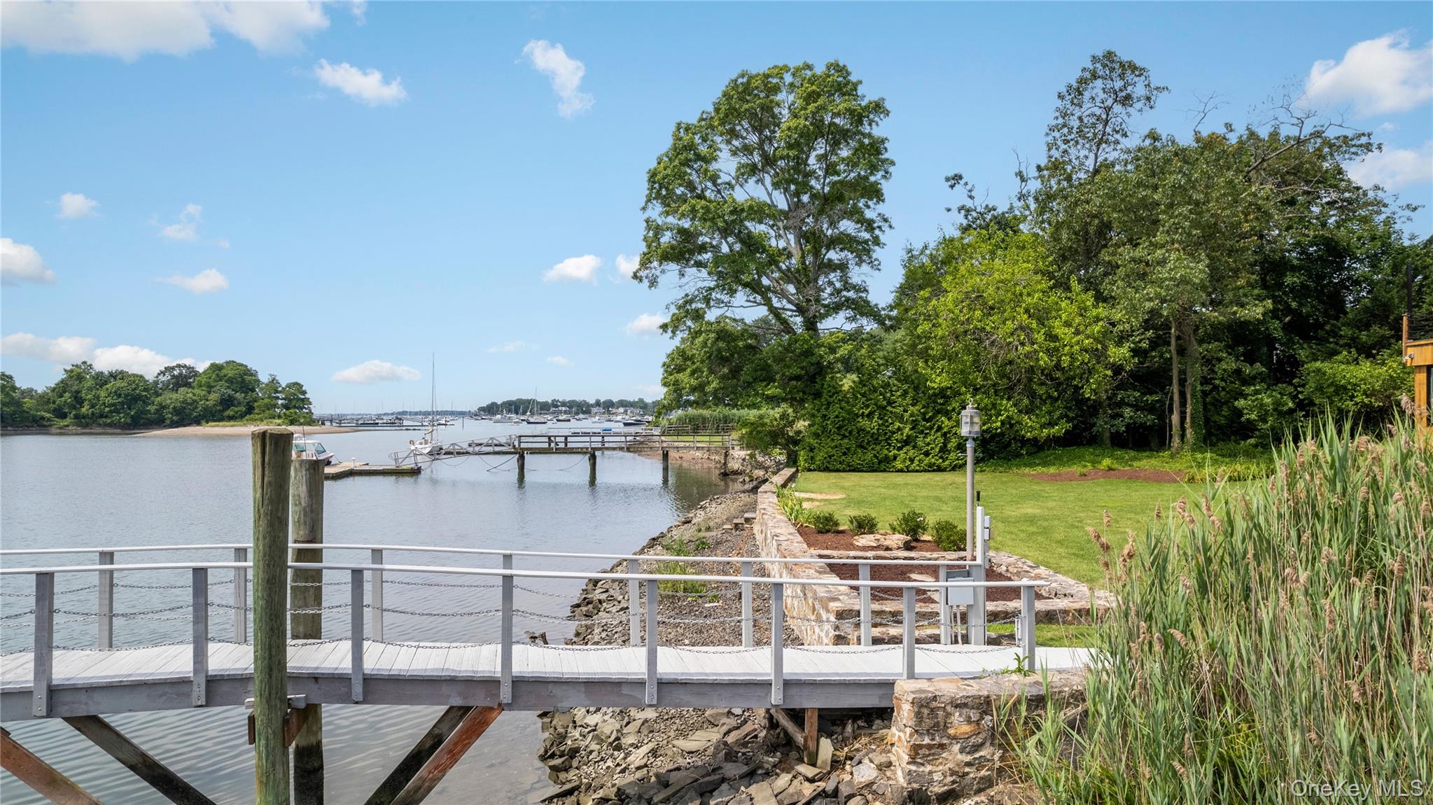 1160 Greacen Point Road Mamaroneck, NY 10543 - Photo 41 of 45 Picturesque walkway to the dock