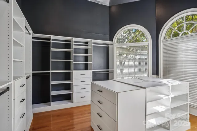 a view of cabinet with washer and dryer