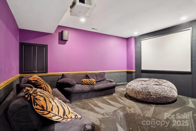 a bedroom with two beds and a couch