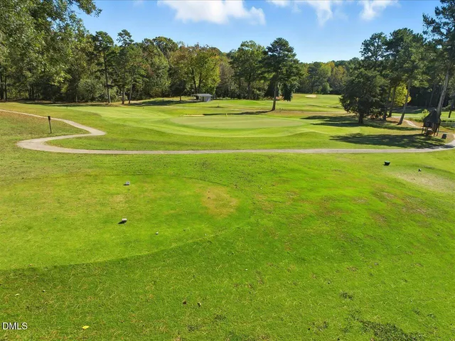 a view of a room with wooden walls