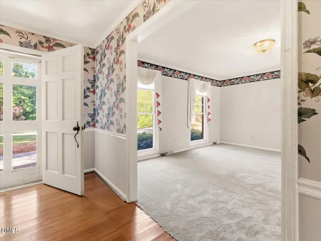 a kitchen with stainless steel appliances granite countertop a stove and a refrigerator
