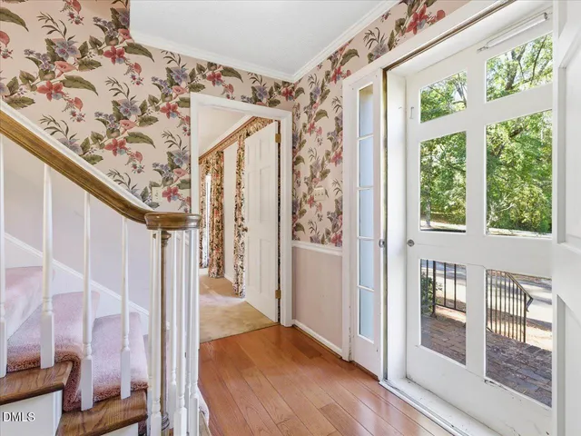 a kitchen with stainless steel appliances granite countertop a refrigerator and a stove