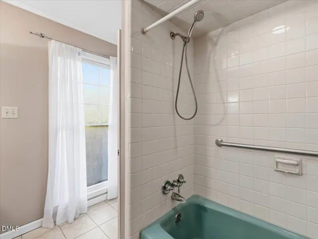 an aerial view of residential house with outdoor space