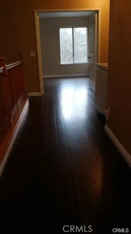 a hallway with cabinets
