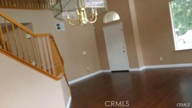 a view of an entryway with hardwood