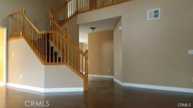 a view of a hallway with staircase