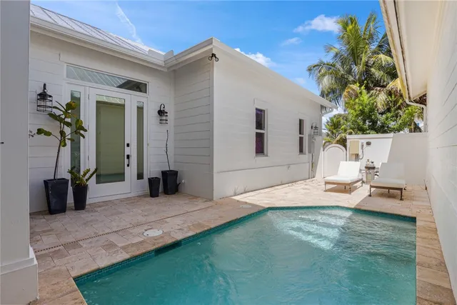 a front view of a house with a patio