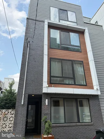 a building with a window and balcony