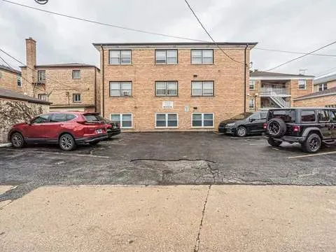a cars parked in front of a house