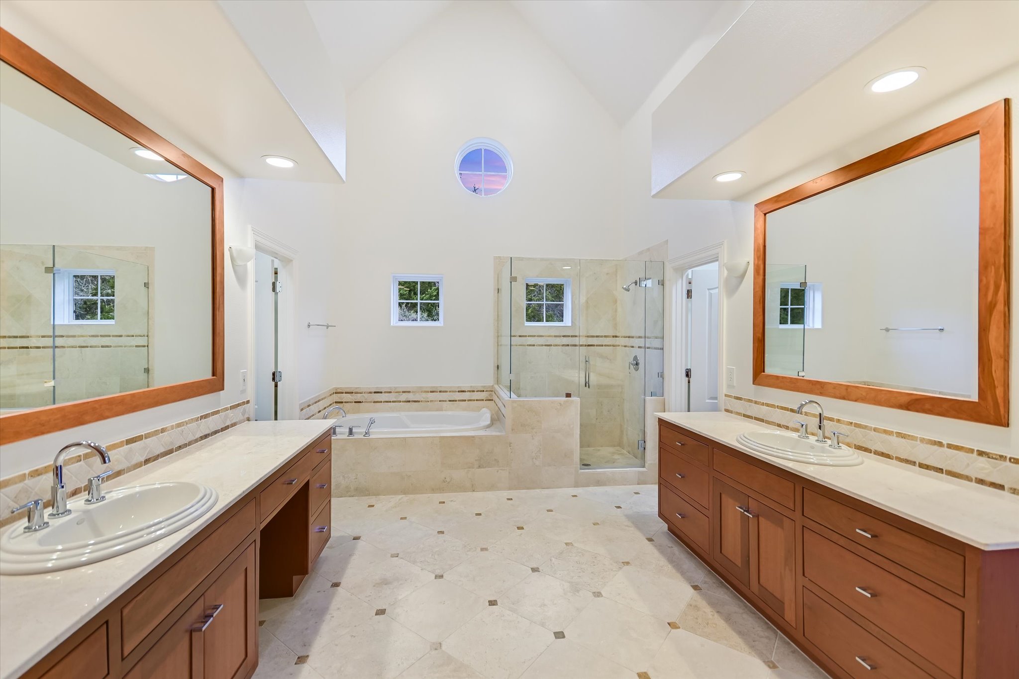 4501 House Of Lancaster Austin, TX 78730 - Photo 20 of 36 a spacious bathroom with a sink mirror and a bath tub