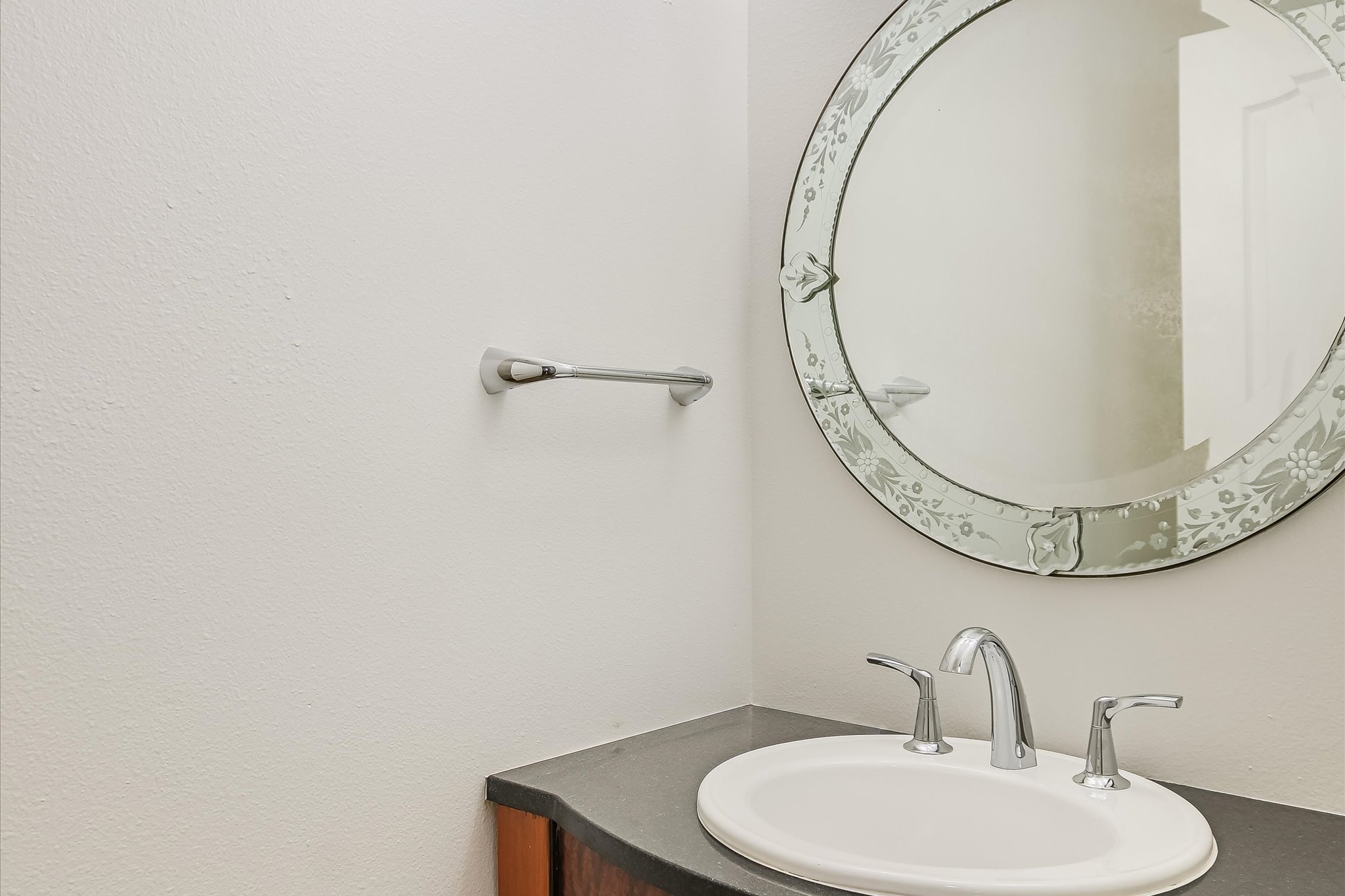 4501 House Of Lancaster Austin, TX 78730 - Photo 27 of 36 a bathroom with a sink and mirror