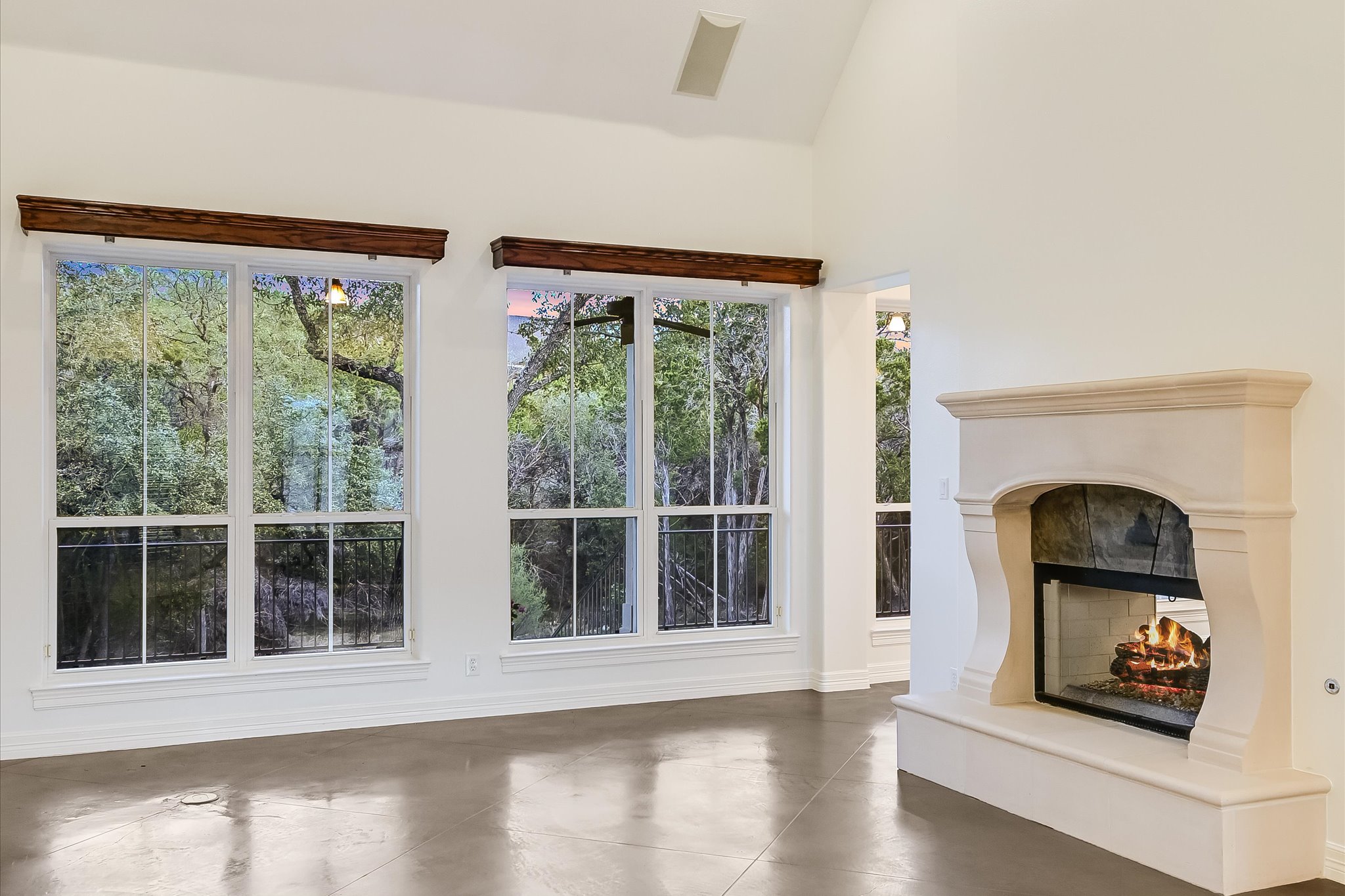 4501 House Of Lancaster Austin, TX 78730 - Photo 7 of 36 a living room with wooden floor and a large window