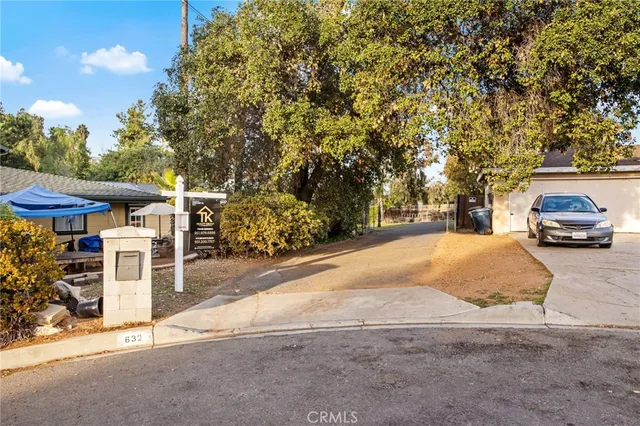 a car parked in front of a house