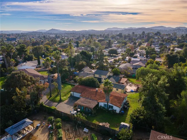 an aerial view of a city with lots of residential buildings