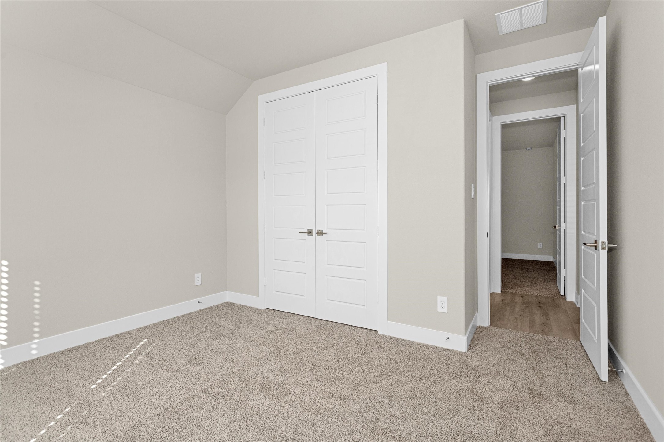 2002 Bluff Oak Street Conroe, TX 77304 - Photo 5 of 30 an empty room with closet area