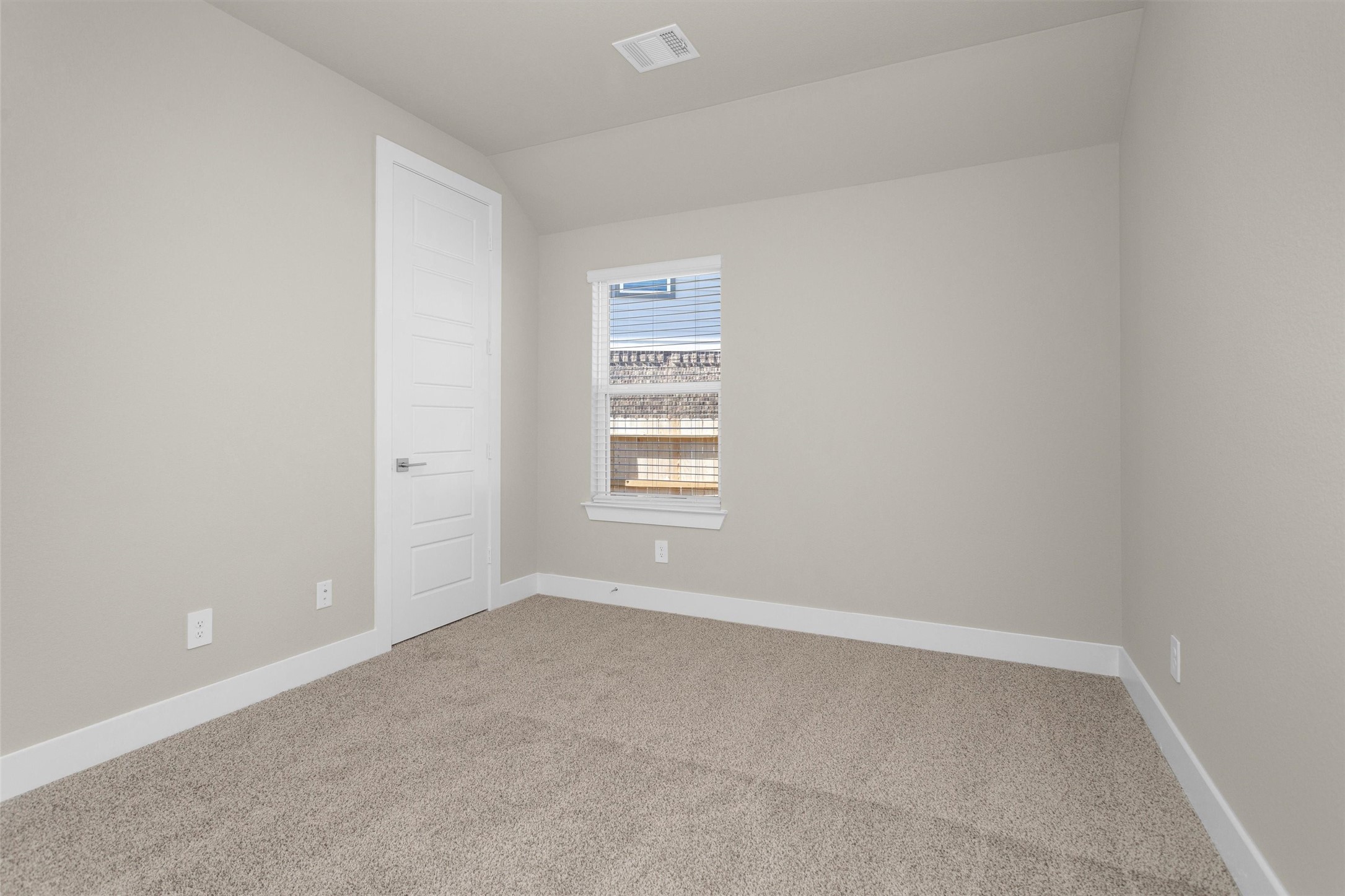 2002 Bluff Oak Street Conroe, TX 77304 - Photo 7 of 30 a view of an empty room with a window