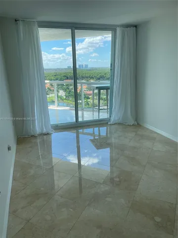 a bathroom with a shower and toilet
