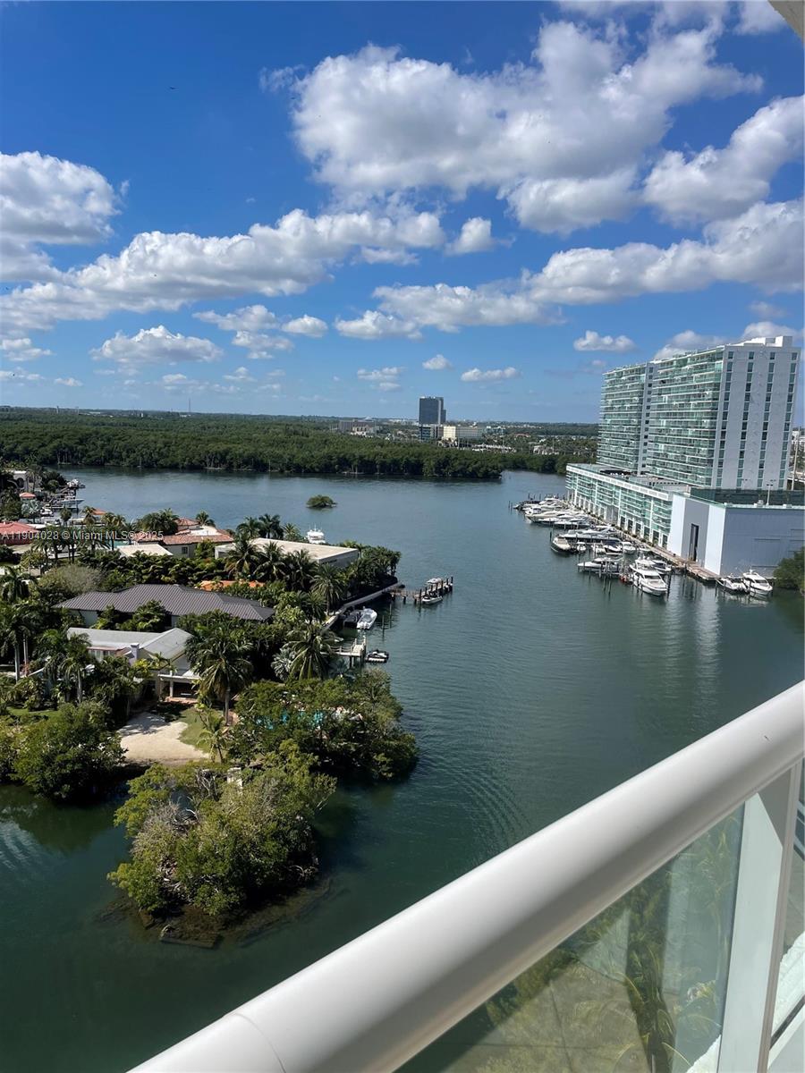 16500 Collins Avenue, Unit 1455 Sunny Isles Beach, FL 33160 - Photo 2 of 35 a view of a lake with a city