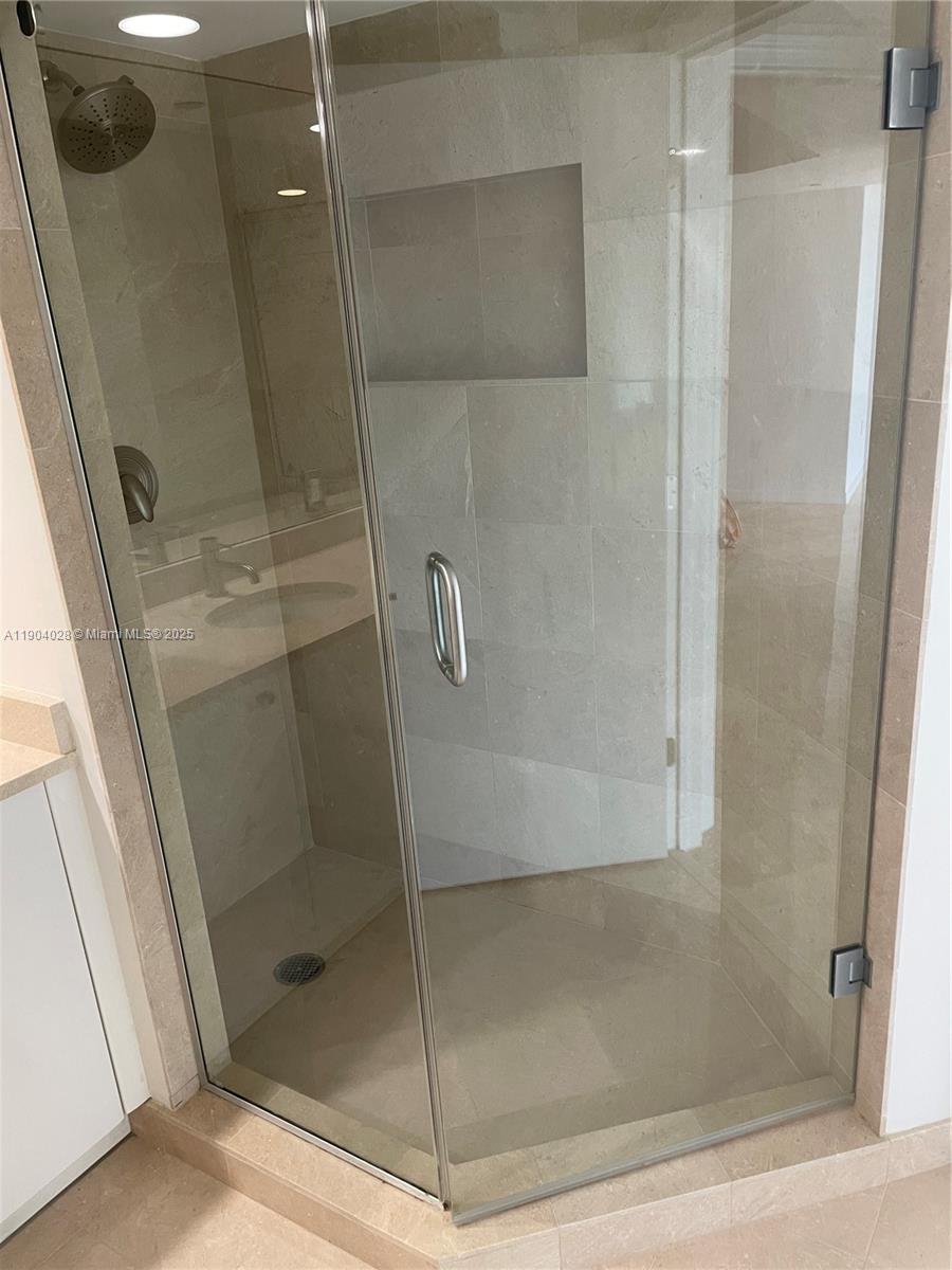 16500 Collins Avenue, Unit 1455 Sunny Isles Beach, FL 33160 - Photo 24 of 35 a bathroom with a shower