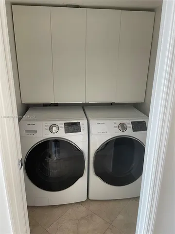 a view of a building with sitting area