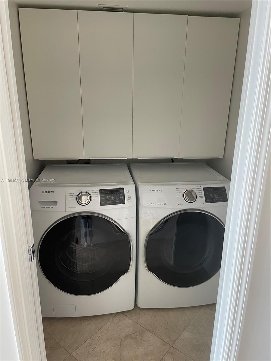16500 Collins Avenue, Unit 1455 Sunny Isles Beach, FL 33160 - Photo 30 of 35 a view of washer and dryer