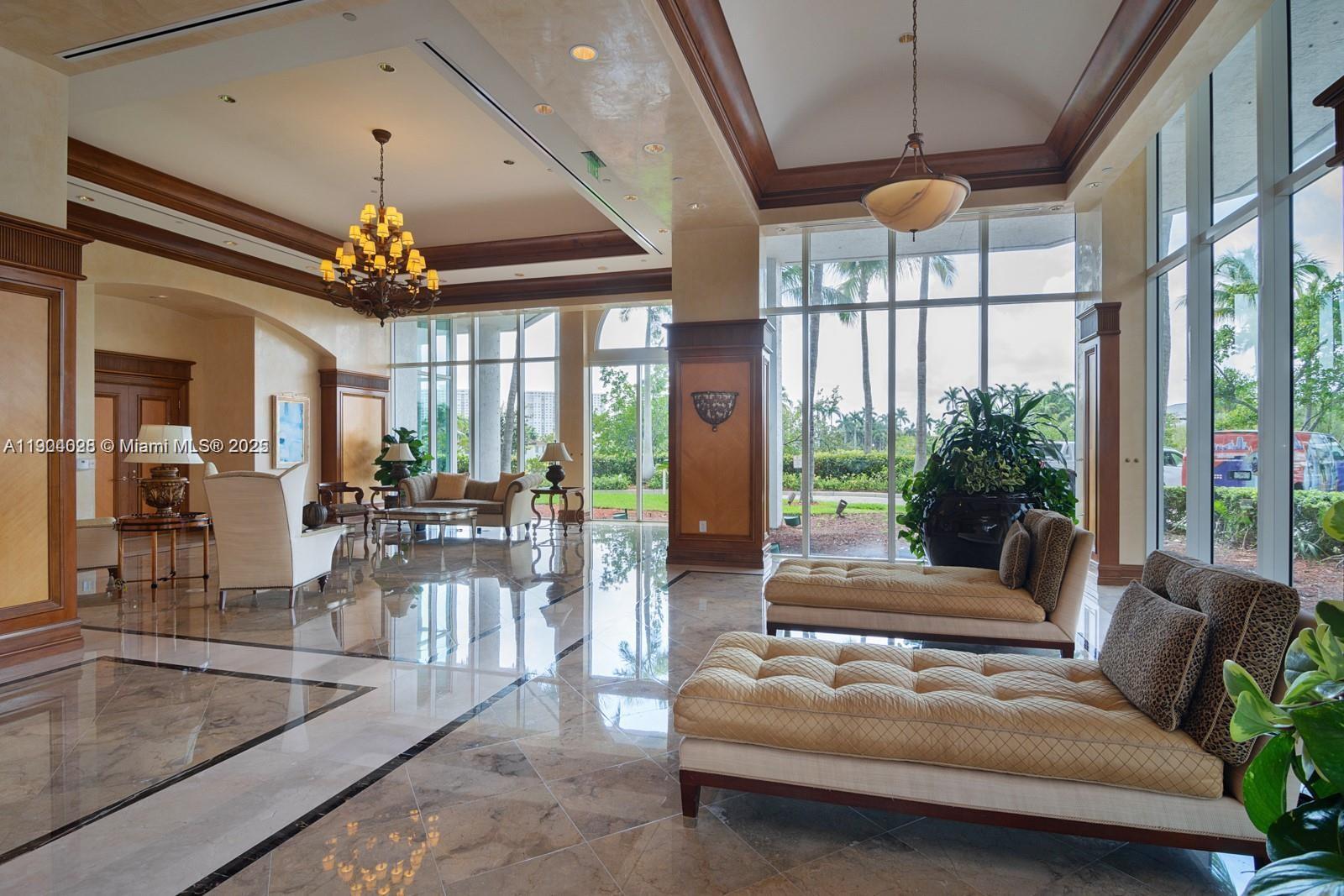 16500 Collins Avenue, Unit 1455 Sunny Isles Beach, FL 33160 - Photo 4 of 35 a outdoor living space with furniture and a large window