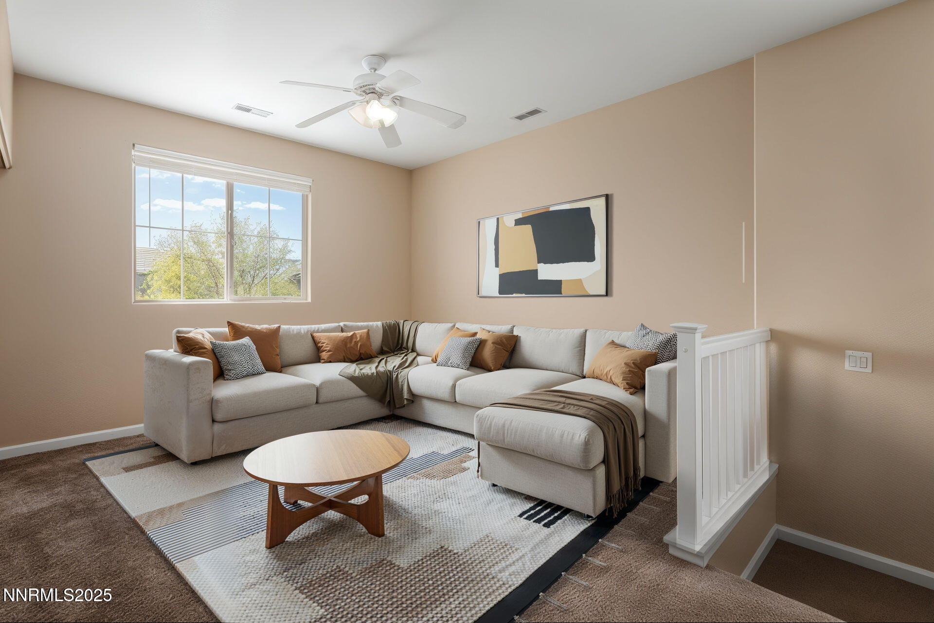 5765 Tappan Drive Reno, NV 89523 - Photo 12 of 27 a living room with furniture a large window and a lamp