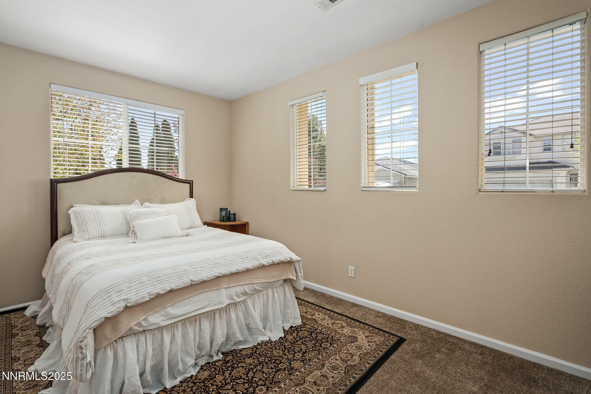 5765 Tappan Drive Reno, NV 89523 - Photo 20 of 27 a bedroom with a bed and a window
