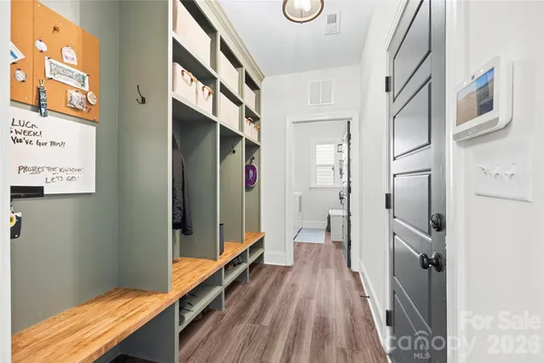 a kitchen with stainless steel appliances a refrigerator and a stove