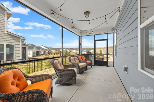 a view of a terrace with outdoor seating
