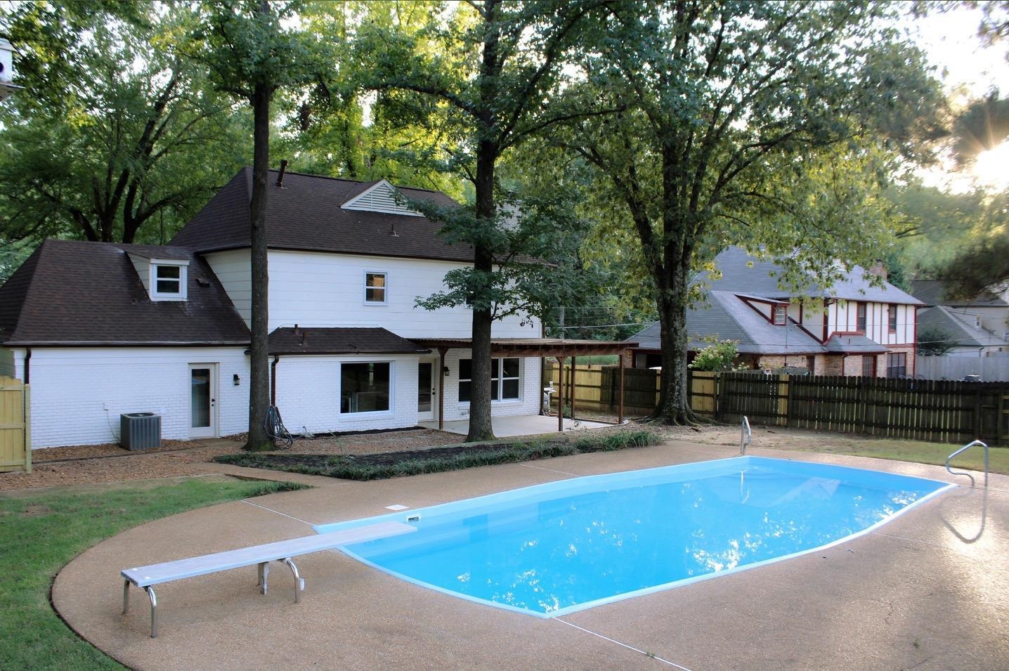 7086 McVay Road Germantown, TN 38138 - Photo 5 of 40 front view of house with a swimming pool