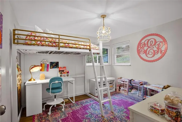 a room with furniture and a chandelier