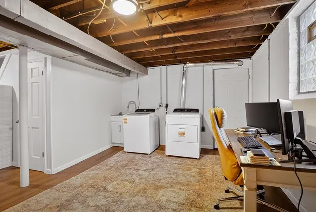 a view of a workspace with furniture