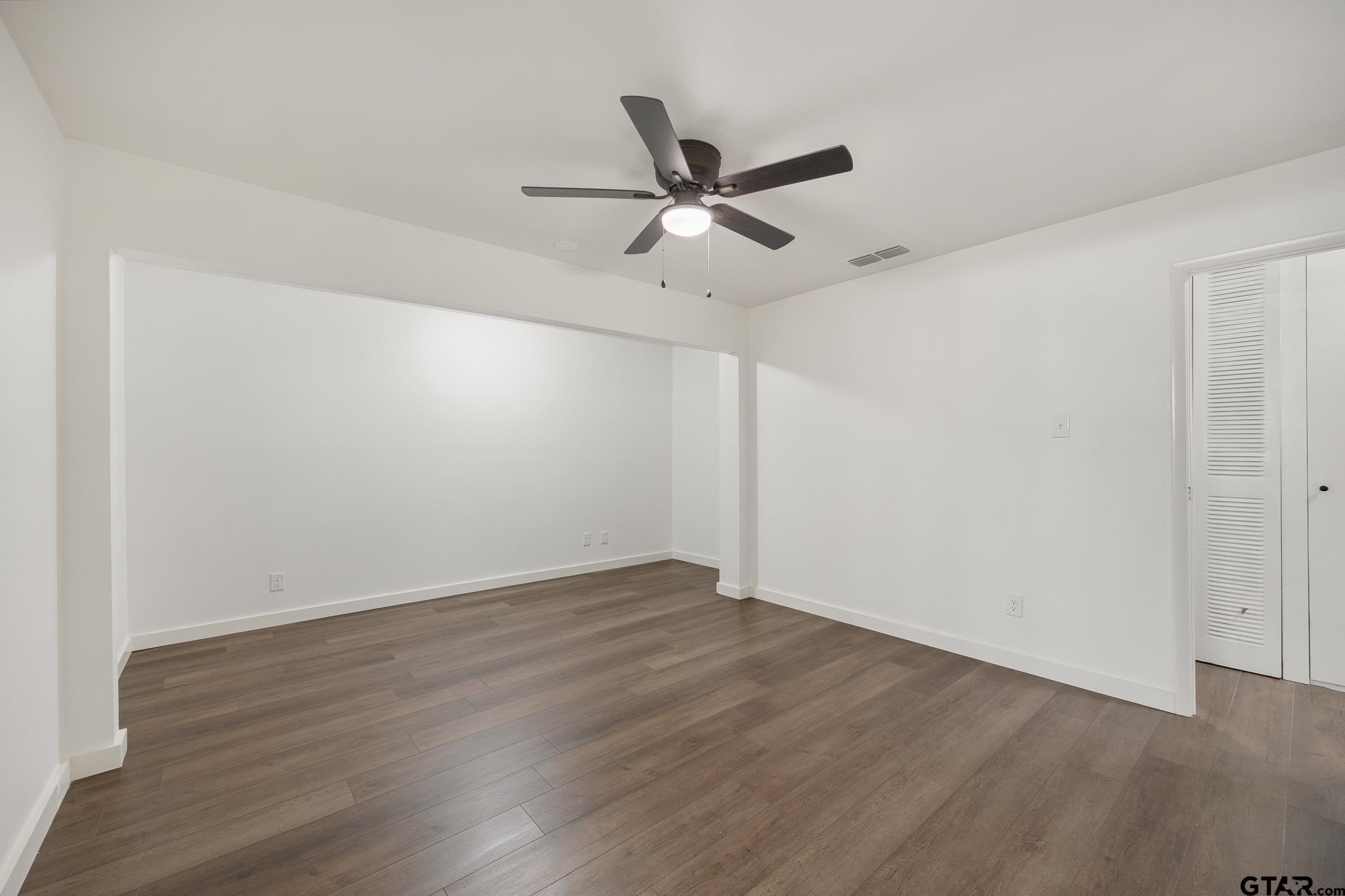 1538 North Hill Road Tyler, TX 75702 - Photo 24 of 29 wooden floor in an empty room