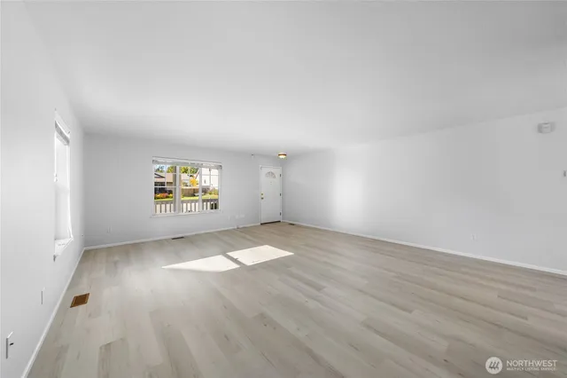 an empty room with windows