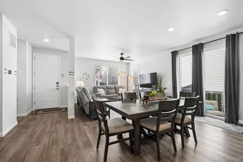 a bedroom with a bed and a television