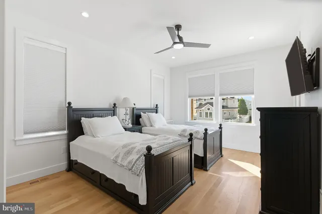 a kitchen that has a stove a microwave oven a sink and a dining table with granite countertop