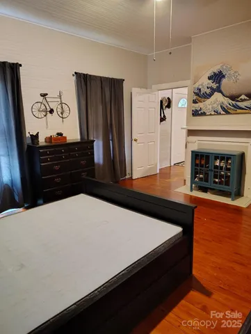 a living room with wooden floor