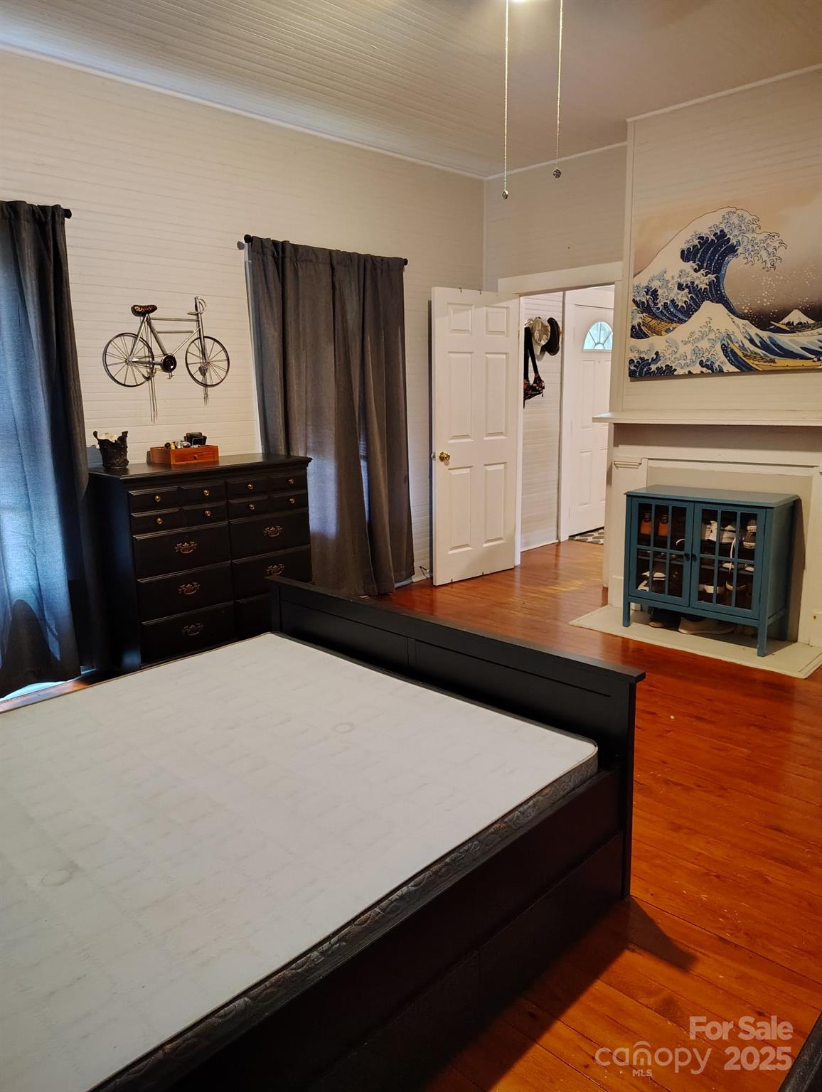 8504 Moores Chapel Road Charlotte, NC 28214 - Photo 13 of 14 a living room with wooden floor