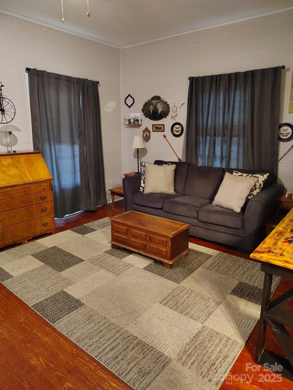 8504 Moores Chapel Road Charlotte, NC 28214 - Photo 14 of 14 a living room with furniture and a gate