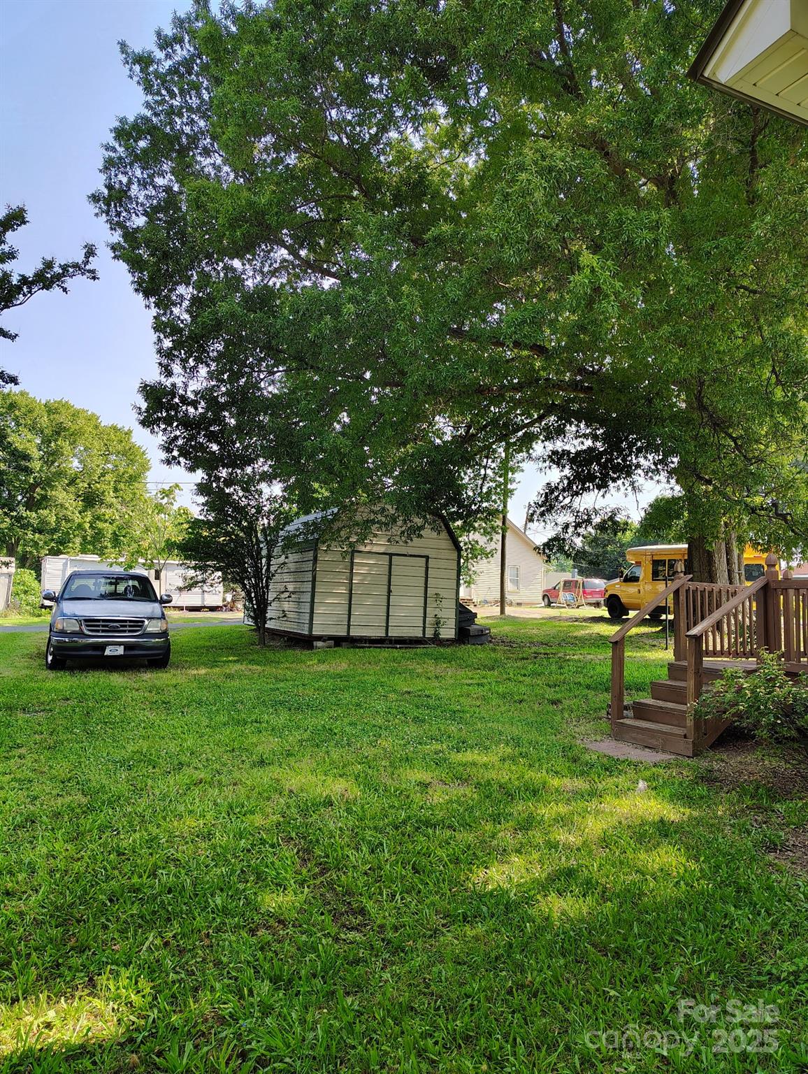 8504 Moores Chapel Road Charlotte, NC 28214 - Photo 5 of 14 a view of a park with bench and trees