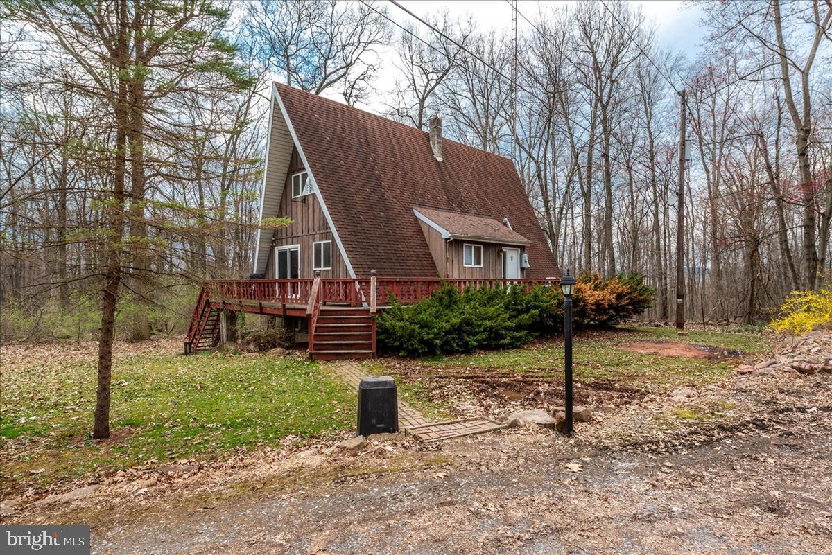 211 Mountain View Circle Denver, PA 17517 - Photo 2 of 31 a view of a house with backyard and a tree