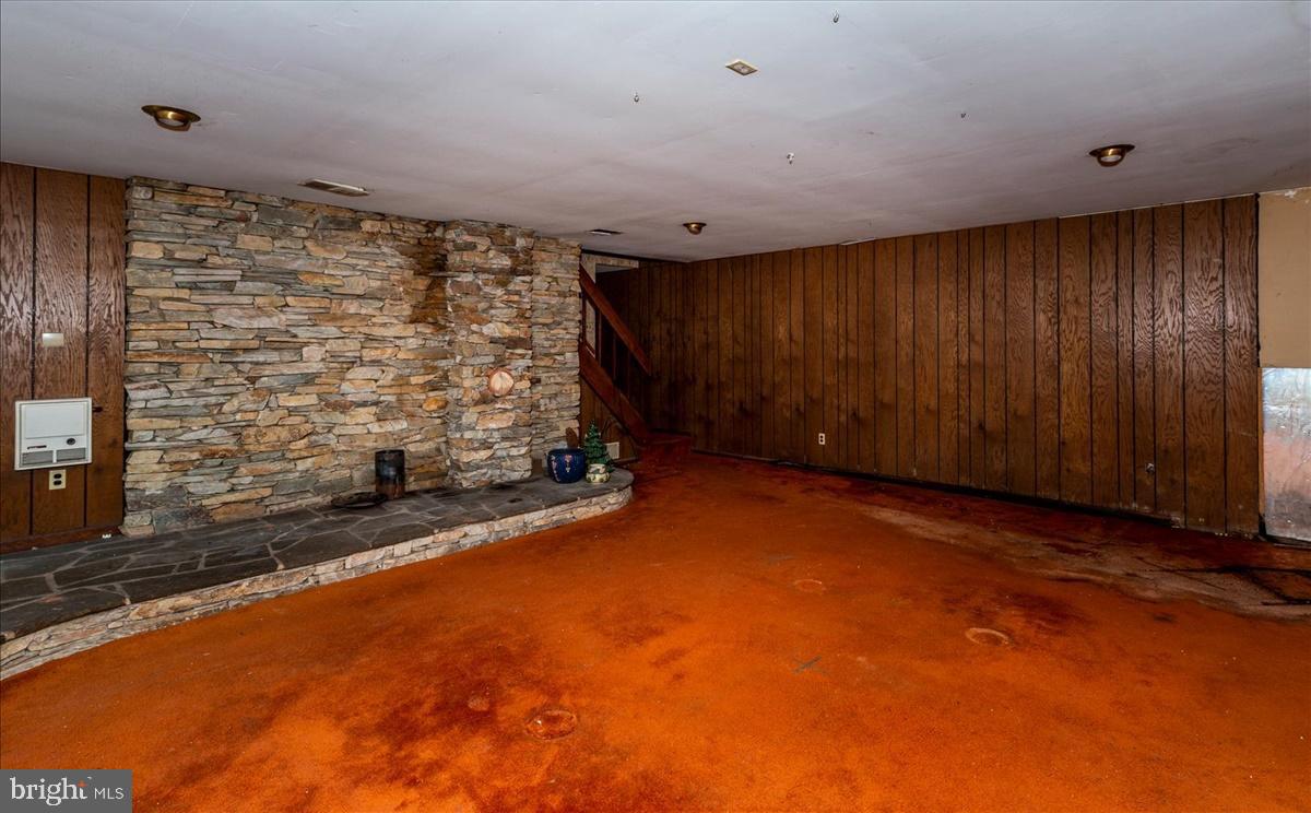 211 Mountain View Circle Denver, PA 17517 - Photo 22 of 31 a view of an empty room with a fireplace
