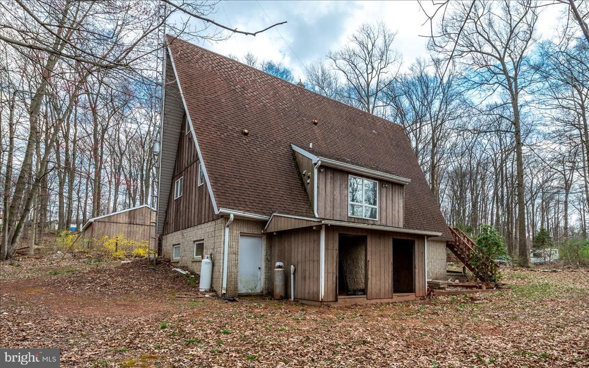 211 Mountain View Circle Denver, PA 17517 - Photo 28 of 31 a house that has a tree in front of it
